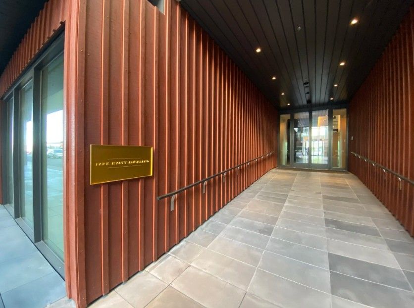 Timber-lined entrance walkway at the Park Hyatt Auckland